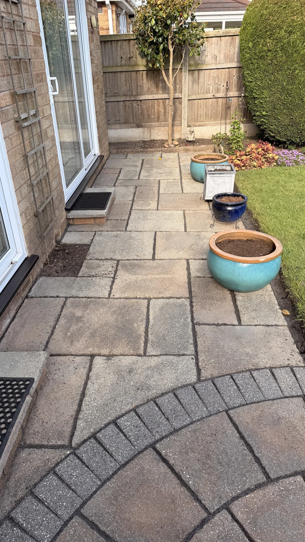 The same patio paving after cleaning